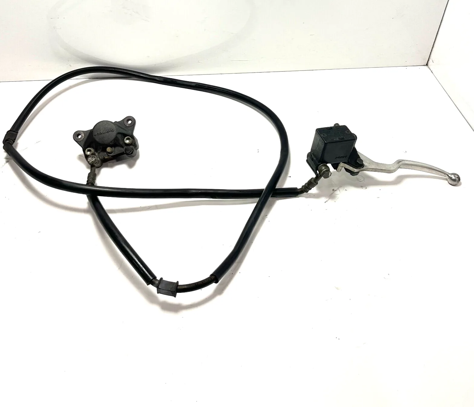 IMPIANTO FRENANTE POSTERIORE SUZUKI BURGMAN 150 (2002-2006) PINZA + POMPA UH 150